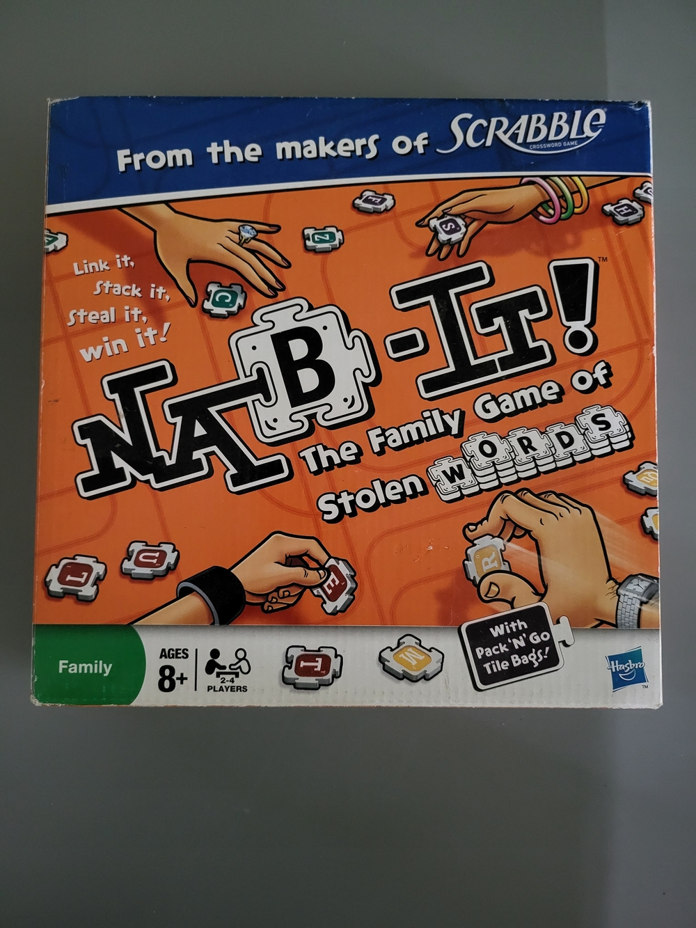Hasbro Nab-It! Family Word Game - Orange Box with Blue Header